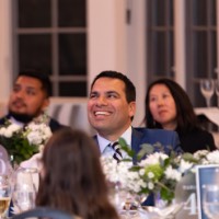 Victor Cardenas smiling at screen